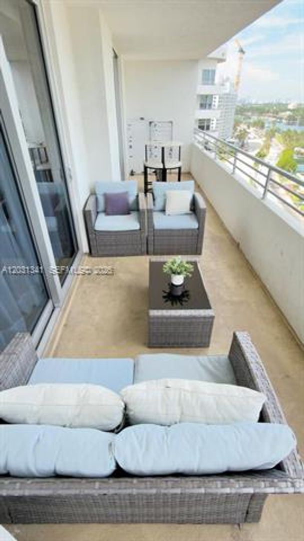 Building Photo - 5555 Collins Ave