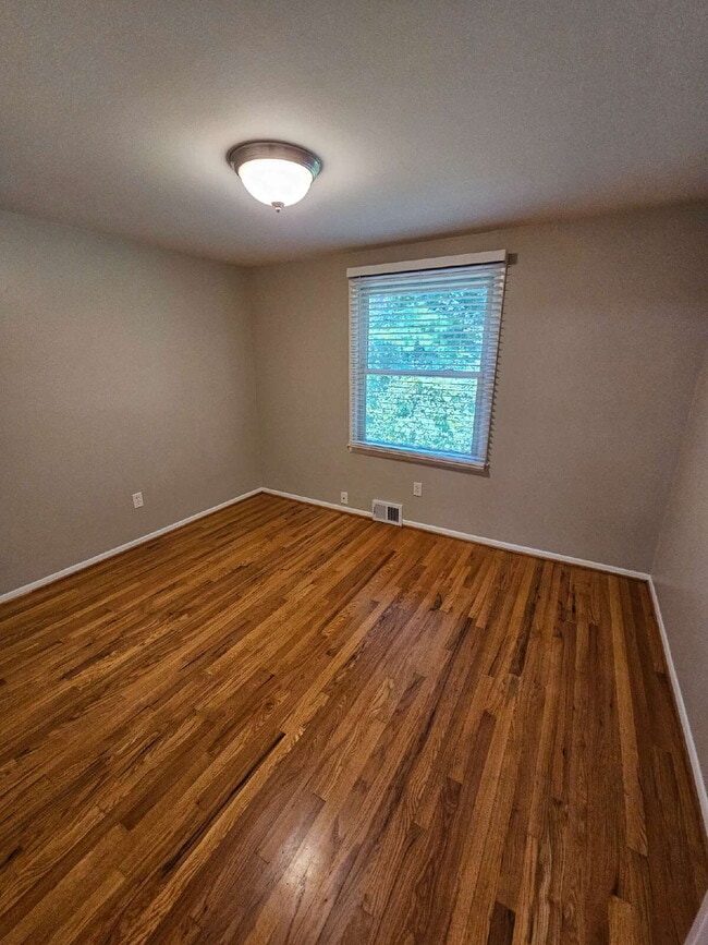 Building Photo - Private 4 Bedroom Home on 0.75 Acres with Great Room Fireplace, Wet Bar & 3-Season Room, 2 Car At...
