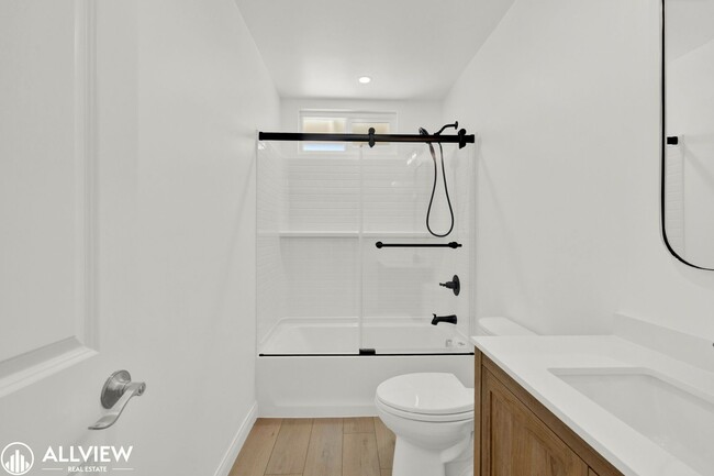 Building Photo - Fully Renovated 4-Bedroom Home with Firepl...