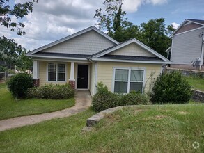 Building Photo - Great three bedroom two bath home Close to...