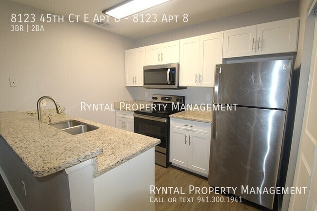 Building Photo - 8123 45th Ct E