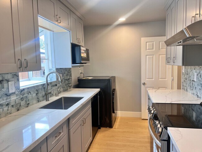 Building Photo - Completely Remodeled 4 Bedroom Home with C...