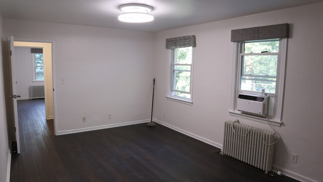 Living room, brand new flooring. - 836 Thorn St