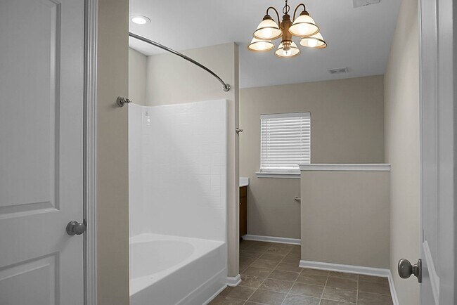 Building Photo - Comfortable Living, 4 BR 2.5 BA Home, Two Car Garage
