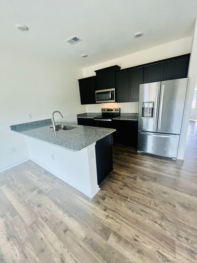 Building Photo - Be the First to Call This Brand New Townho...
