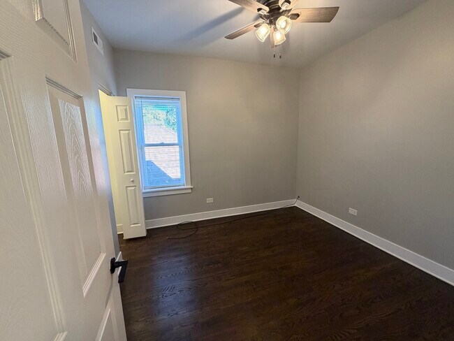 Building Photo - 7823 S Colfax Ave