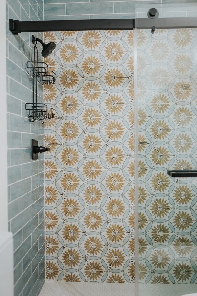 Eye-catching floor and wall tile design - 108 W Henry St