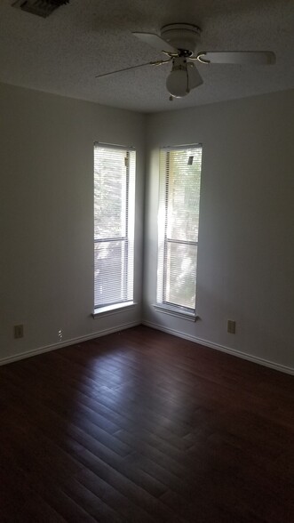 All bedrooms feature wood-look vinyl plank flooring - 7235 Rimwood St