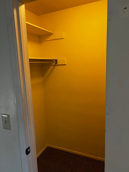 Walk in closet in guest room - 1032 Leisure World