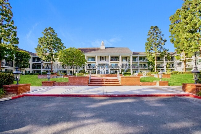 Building Photo - Updated Newport Beach Condo in Gated Versailles Community with Resort-Style Amenities