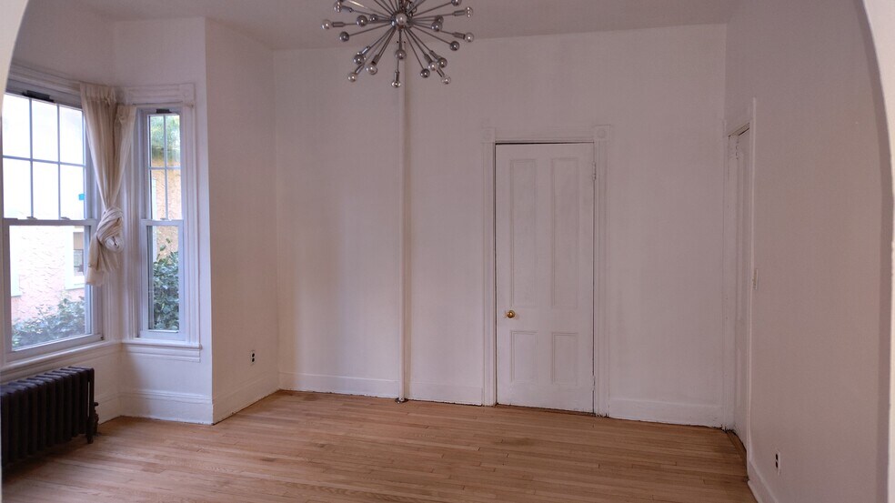 FORMAL DINING ROOM WITH CLOSET AND SPUTNIK CHANDELIER - 4 Edmarth Pl