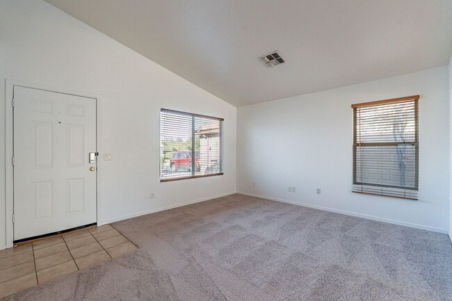 Building Photo - Three bedrooms! Fresh Carpet and Paint!