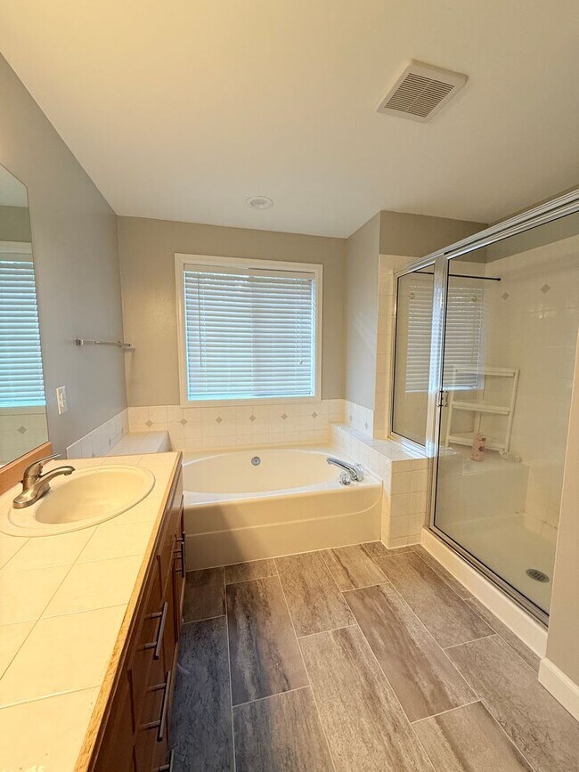 Building Photo - Beautiful 4-Bedroom Home with Expansive Deck & 3-Car Garage – Minutes to Mill Creek Town Center