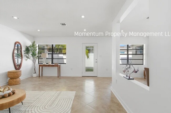 Building Photo - Gorgeous 4 Bedroom in Dunedin! Full Upgraded w/ a Pool!! AVAILABLE FOR IMMEDIATE MOVE IN!!