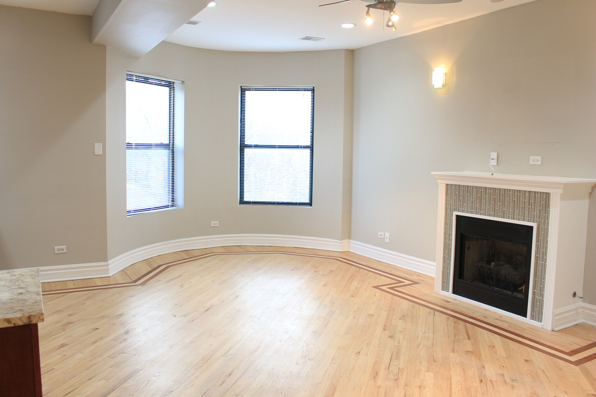 open concept living room with fireplace - 4541 s prairie ave