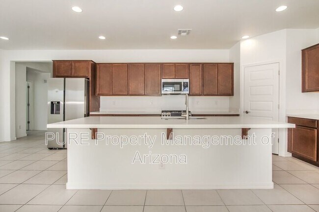 Building Photo - 3769 N 102nd Ave