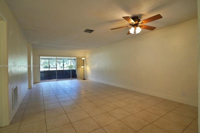 Building Photo - 6555 NW 99th Ave