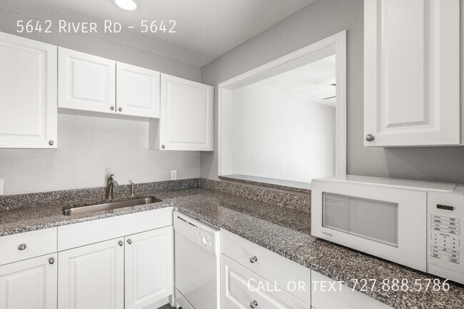 Building Photo - 5642 River Rd