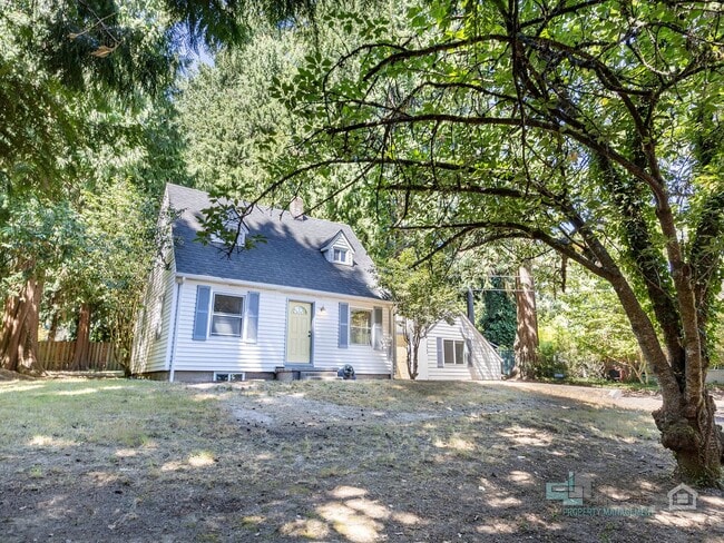 Building Photo - 3 Bedroom... Sweet Story-Book Mid-Century ...