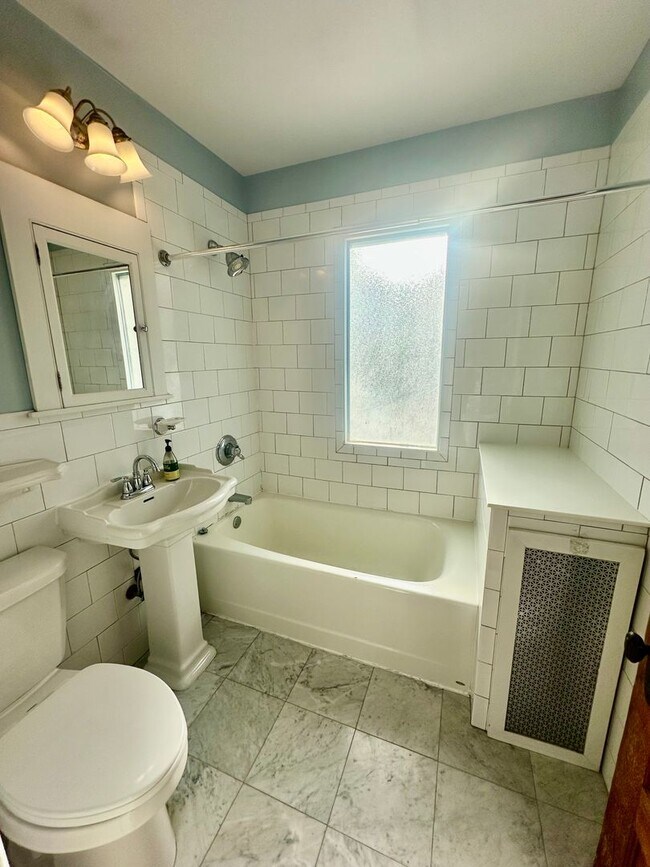 Building Photo - Spacious 3-Bedroom w/ Sundeck & In-Unit Laundry!