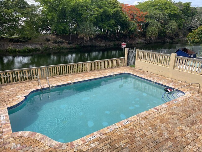 Building Photo - 4275 NW S Tamiami Canal Dr