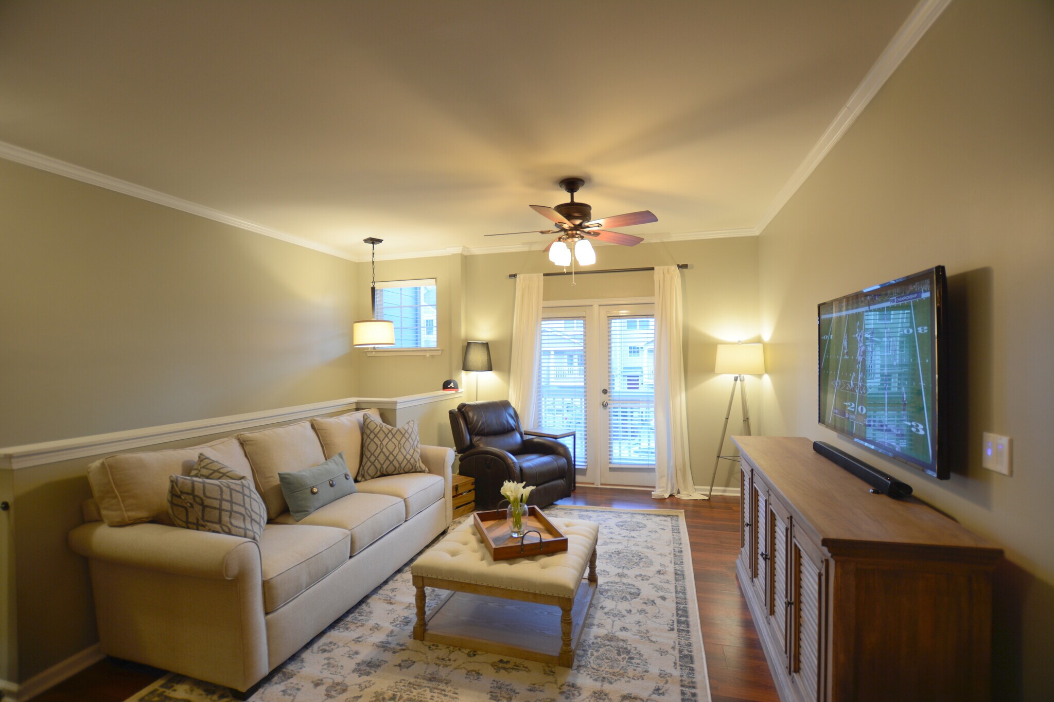 Living room looking out to the front balcony - 1256 Liberty Pkwy NW