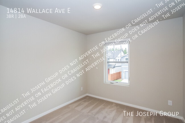Building Photo - 14814 Wallace Ave E