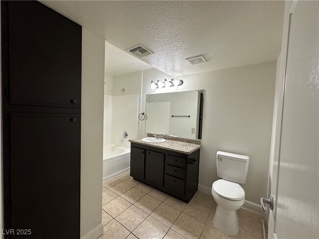Building Photo - 5055 W Hacienda Ave