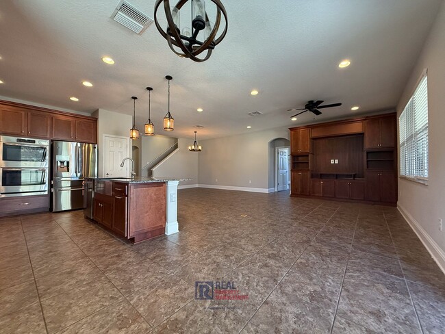 Building Photo - Entertainer’s Dream Home with Gourmet Kitc...