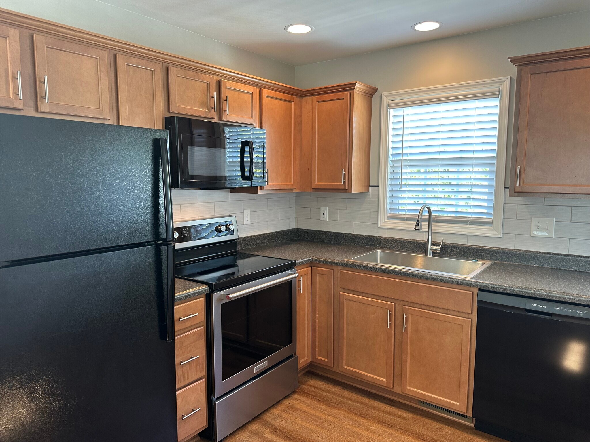 Well appointed kitchen with plenty of cabinets, counter space - 2312-A Belle Ave NE