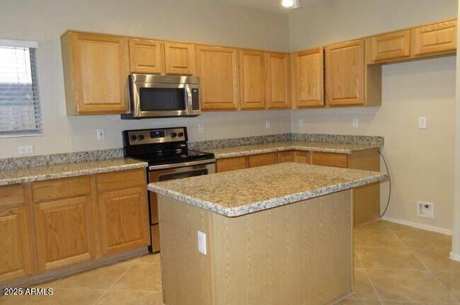 Building Photo - 1122 W Wildhorse Dr