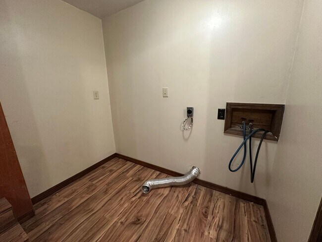 Building Photo - Available July 1st***Welcome to this charming 4-bedroom, 2-bathroom home located in the heart of ...