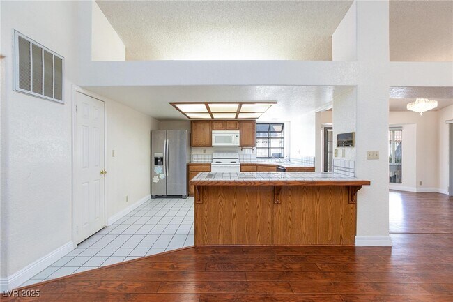 Building Photo - 6442 W Mesa Vista Ave