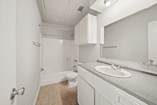 Building Photo - AVAILABLE NOW! - 18-MONTH MINIMUM LEASE REQUIRED