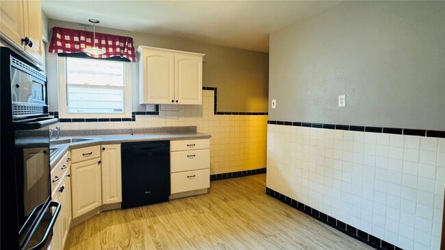 Building Photo - 9319 Aster Ave