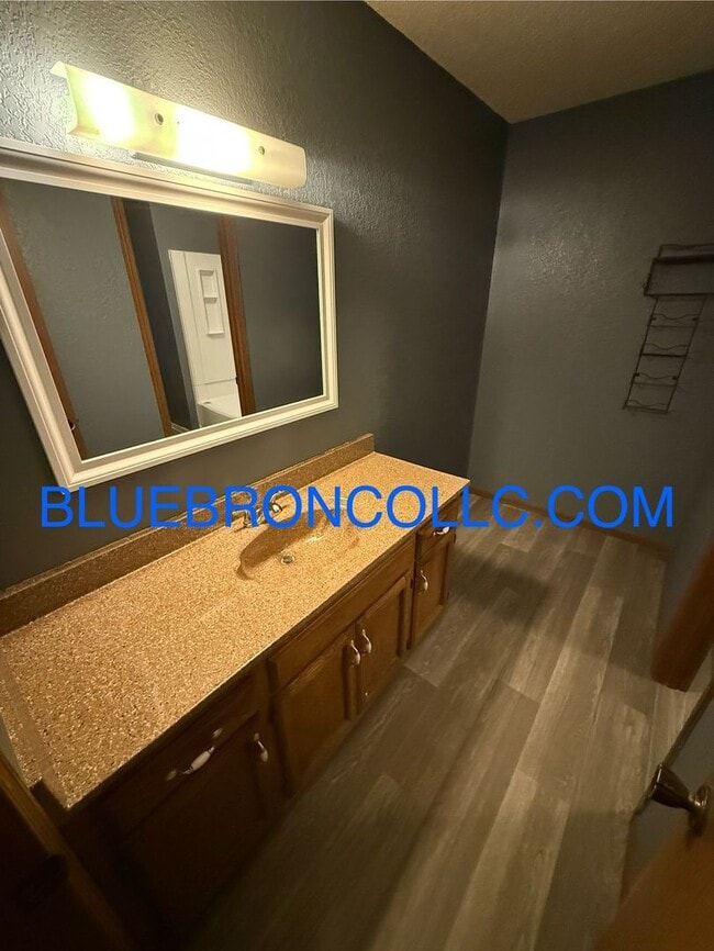 Building Photo - New flooring and fresh paint in this spaci...