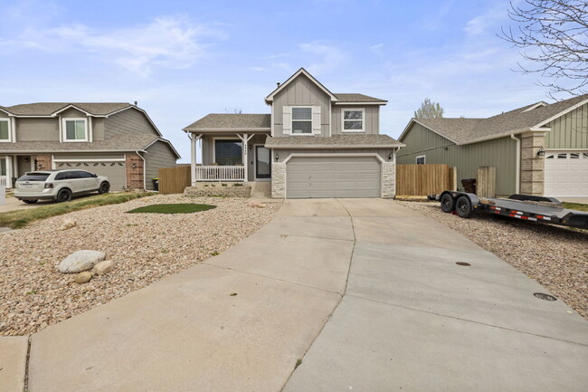 Building Photo - Spacious 4-Bedroom Home with Fenced Yard, 2-Car Garage & Scenic Views in Cheyenne Meadows