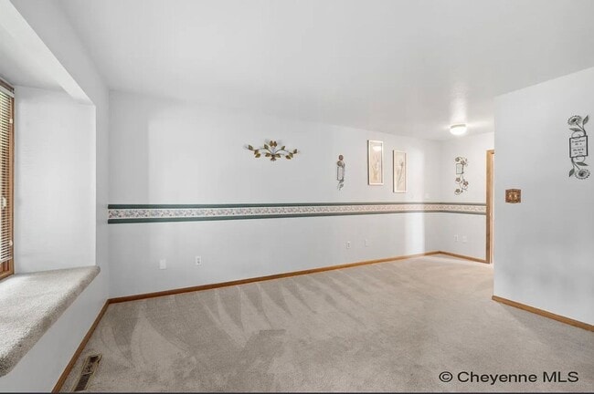 Building Photo - 3 BEDROOM, 2 BATHROOM TOWNHOME WITH 1 CAR ...