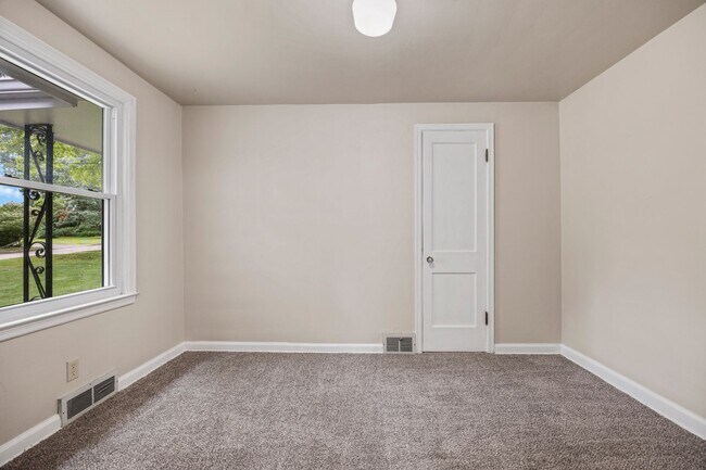 Building Photo - 4 Bedroom Remodeled with 2 Stall Detached Garage