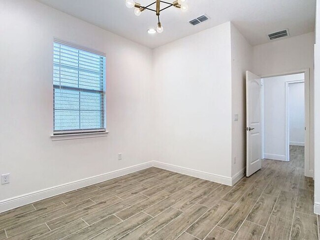 Building Photo - Gorgeous 3/2 Modern Home with a 2 Car Gara...