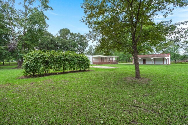 Building Photo - beautifully refreshed 3-bedroom, 2-bath home offering peaceful country living with modern updates!