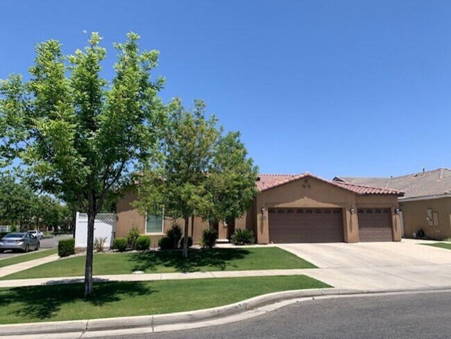 Primary Photo - Elegant 4-Bedroom Home with Paid Solar in Gated Village Green Community