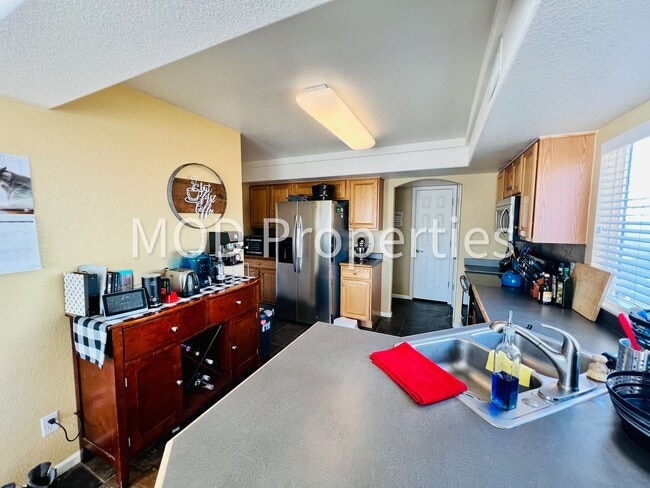 Building Photo - $0 DEPOSIT OPTION. GREEN VALLEY RANCH, CORNER LOT, BIG DECK, LOFT, STAINLESS APPLIANCES!