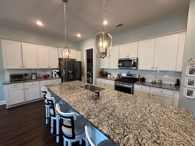 Building Photo - Spacious 4BR Townhome in Mount Pleasant | 2-Car Garage | Built 2020 | 2200 Sq Ft