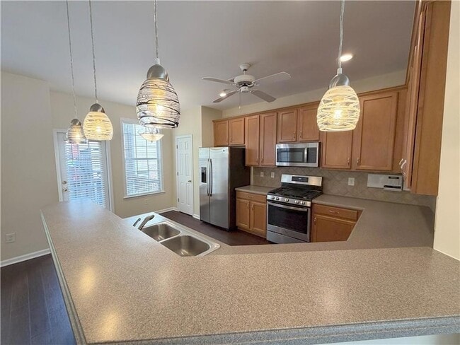 Building Photo - 4680 Creekside Villas Way