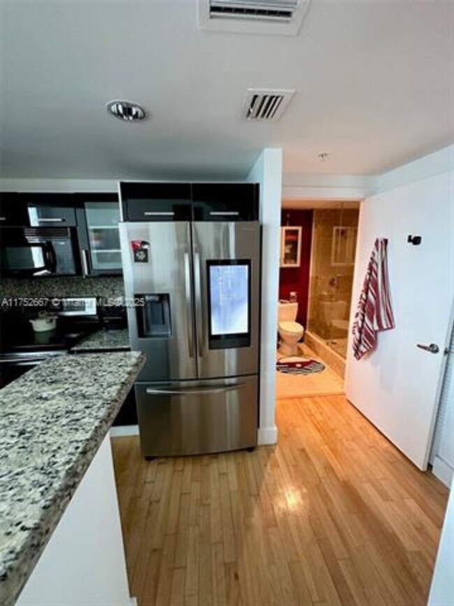 Building Photo - 7728 Collins Ave