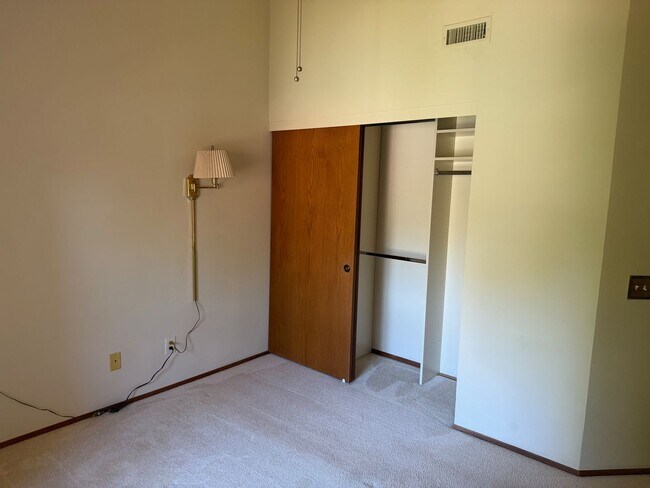 Building Photo - Private Oasis with Sunroom, Balcony & Lush Landscaping | 4BR Home Near Community Pool & Spa