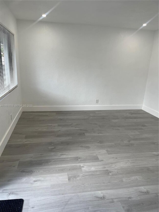 Building Photo - 880 NW 8th Ave