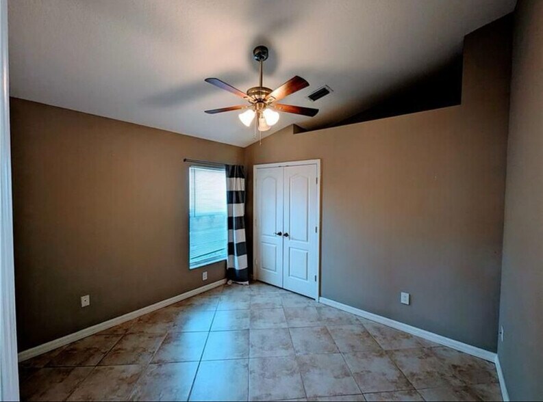 2nd bedroom with new tile and fixtures - 562 SW Saint Martins Cv