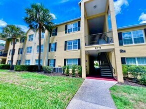 Building Photo - MOVE IN NOW!! Gated community Miriada! 1st floor 1X1.5 bath condo near pool area!!! Laminate wood...